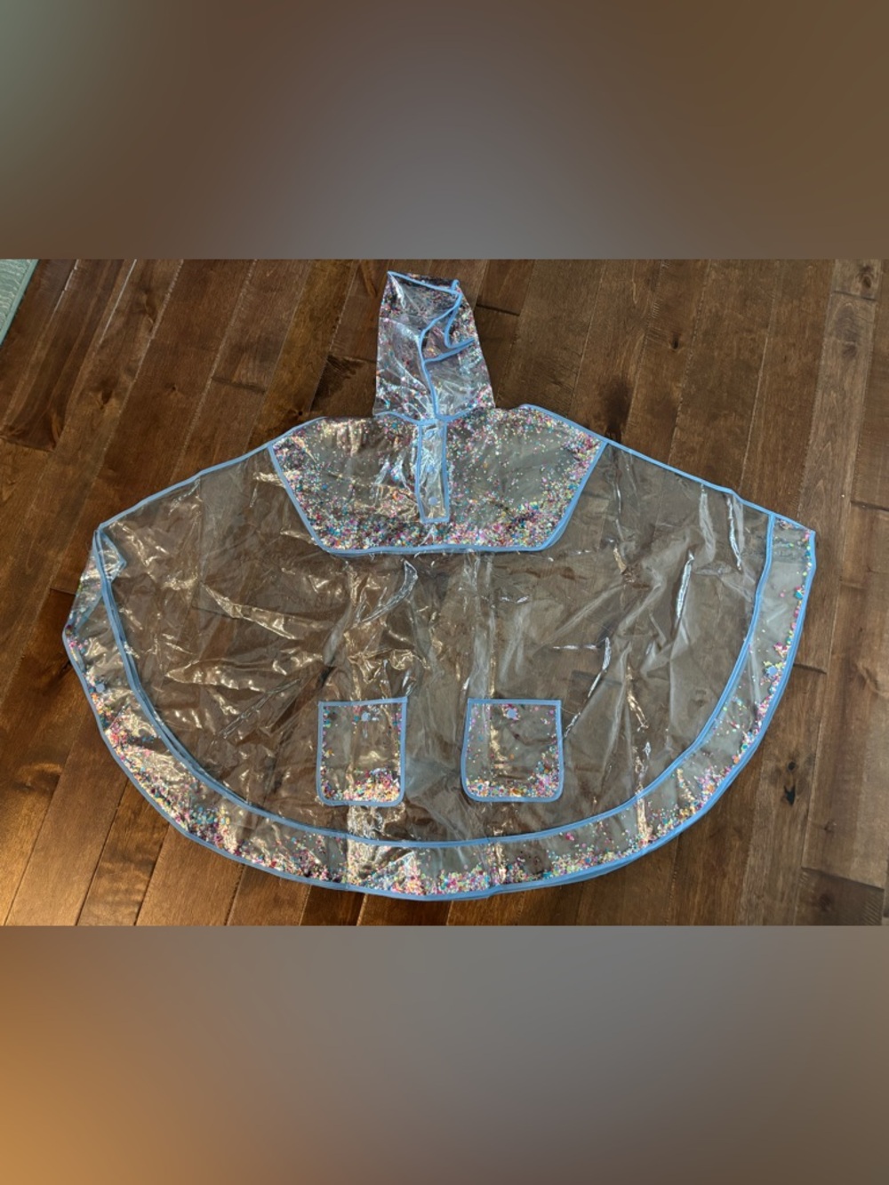 Packed Party Clear PVC Poncho with Blue Trim and Multicolor Confetti